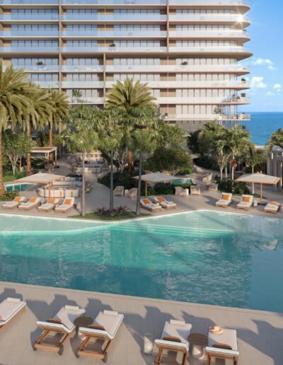 Luxury beachfront condo with tropical pool, palm trees, and ocean view in Sunny Isles, Miami