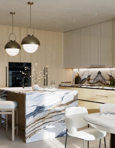 Modern open-concept kitchen with marble island and luxury finishes in Miami beachfront condo