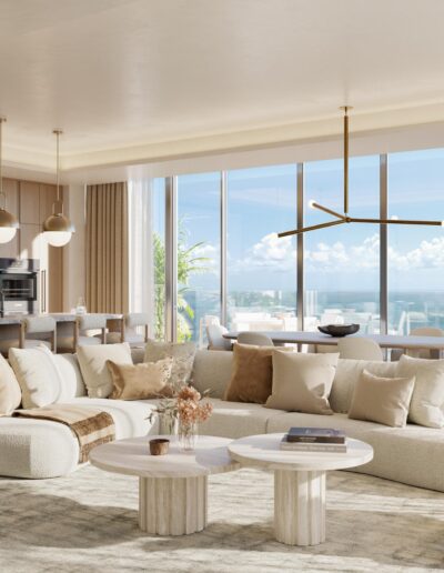 Luxury open-concept living room and kitchen with marble island and ocean views in Miami condo